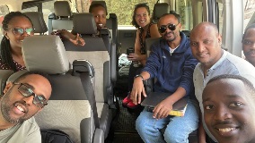 People sitting in car